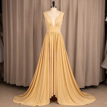 Elegante vestido de dama de honor de satén elástico con escote en V, espalda descubierta, volantes y sin mangas con abertura 
