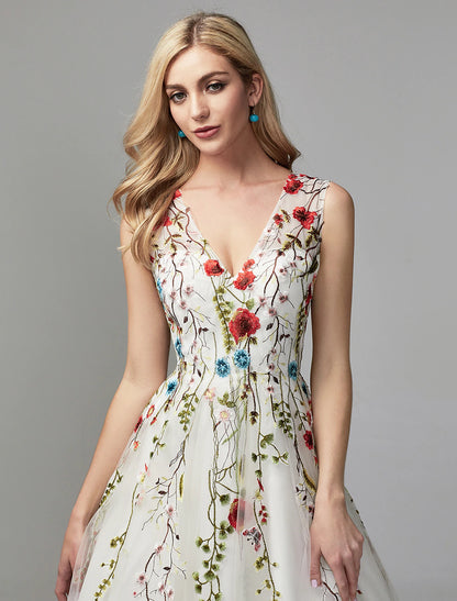 Side view of an elegant A-line V-neck lace floral gown.