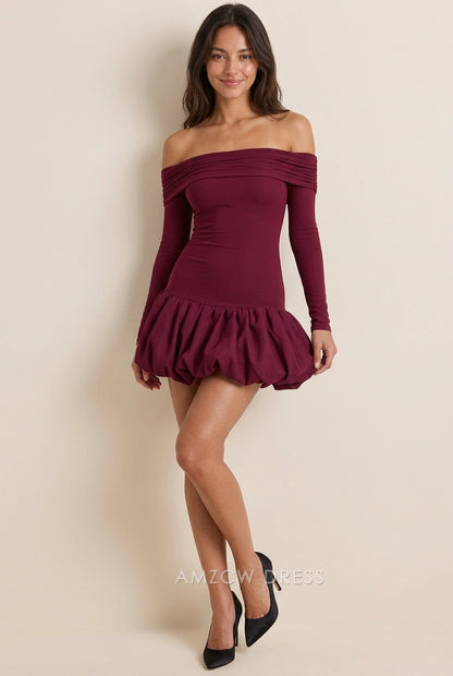 Close-up of the ruched off-shoulder neckline and bubble skirt on a burgundy mini dress.