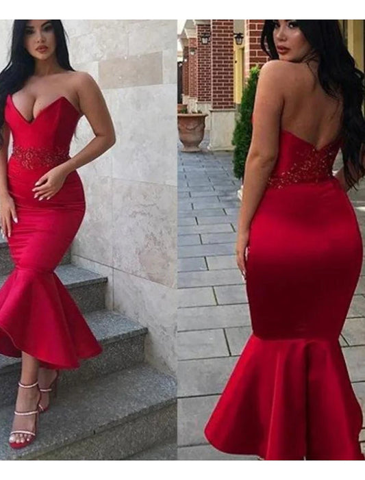 Elegant mermaid trumpet party dress with a backless V-neck and appliques, shown in full length.