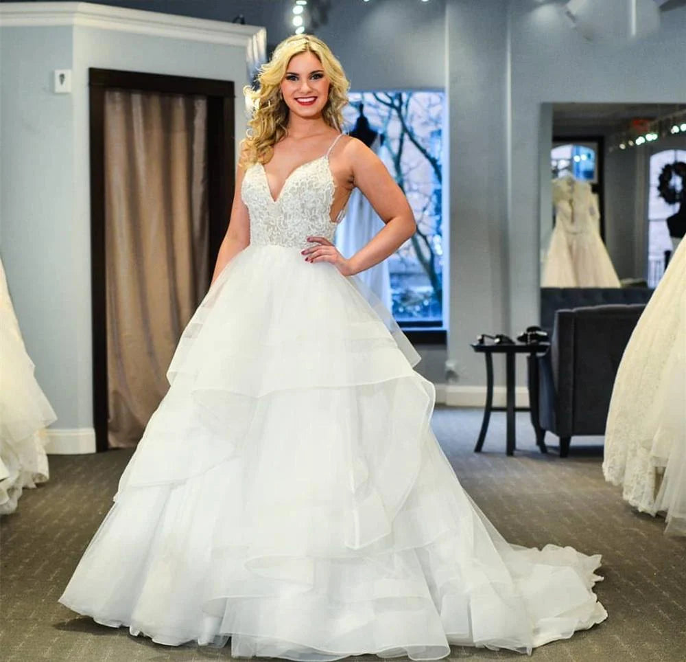 Elegante vestido de novia de tul con escote en forma de corazón y tirantes finos con cuentas en capas 