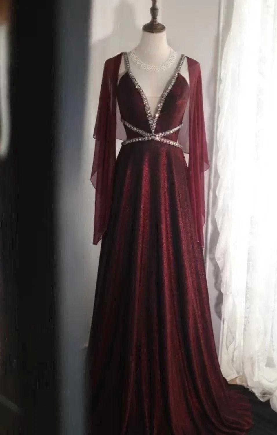Evening Dress Deep V-Neck Gown with Crystal Embellishments Sheer Cape Sleeves and Open Back