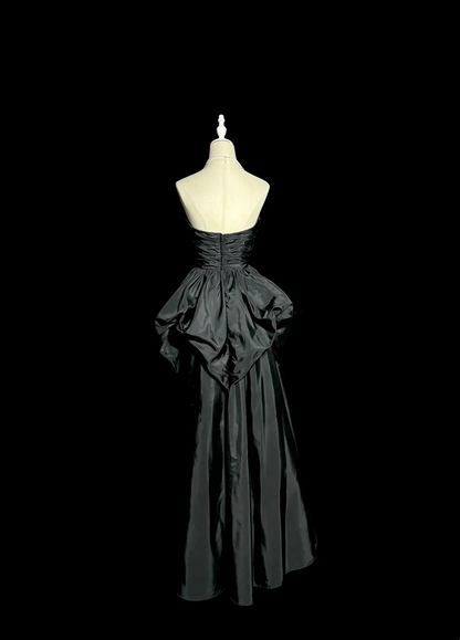 Evening Dress Strapless Black Satin Gown with Ruched Bodice, Crystal Accent and Dramatic Peplum Skirt