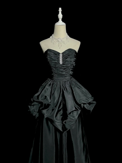Evening Dress Strapless Black Satin Gown with Ruched Bodice, Crystal Accent and Dramatic Peplum Skirt