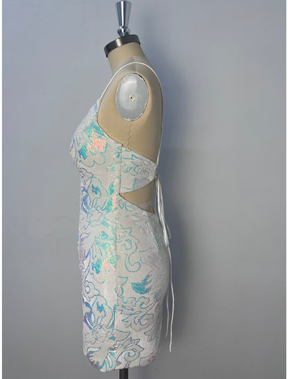 Detail of the spaghetti strap and neckline of the floral glitter dress.