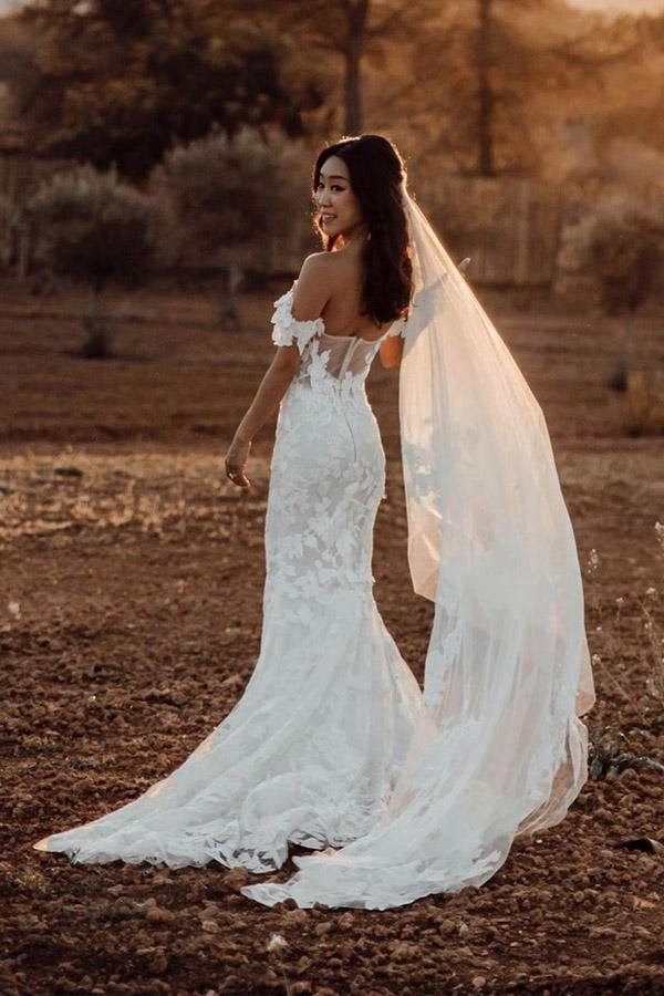 Vestidos de novia de sirena de tul con hombros descubiertos y apliques de cola larga 