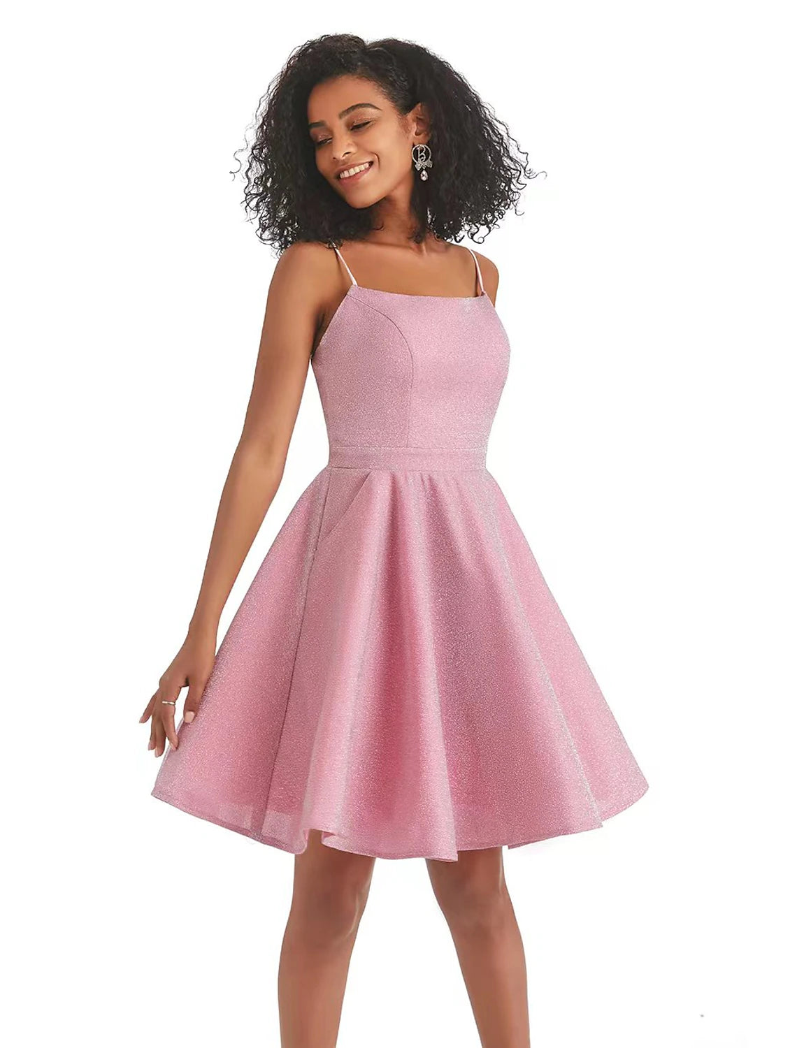 Front view of a short pink A-line dress with sparkling sequins and lurex fabric.