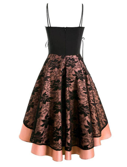 Model in the black Gothic Lolita dress, with a focus on the flared mini skirt.