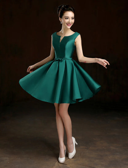 Close-up of the jewel neck and luxurious satin fabric of the dress.