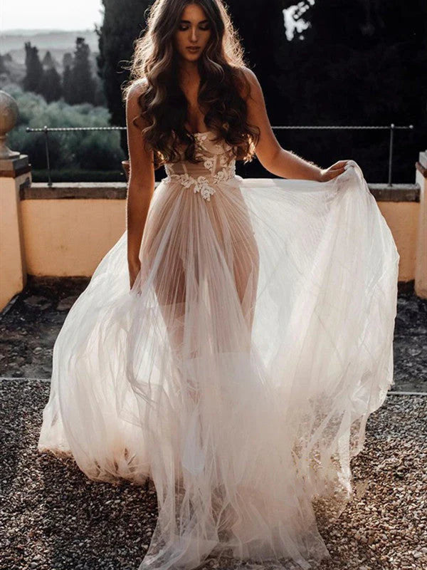 Vestido de novia elegante con espalda abierta, escote redondo y tirantes finos 