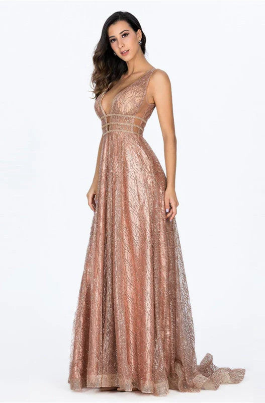 Vestido de fiesta largo estilo imperio dorado con corte en A y brillo 