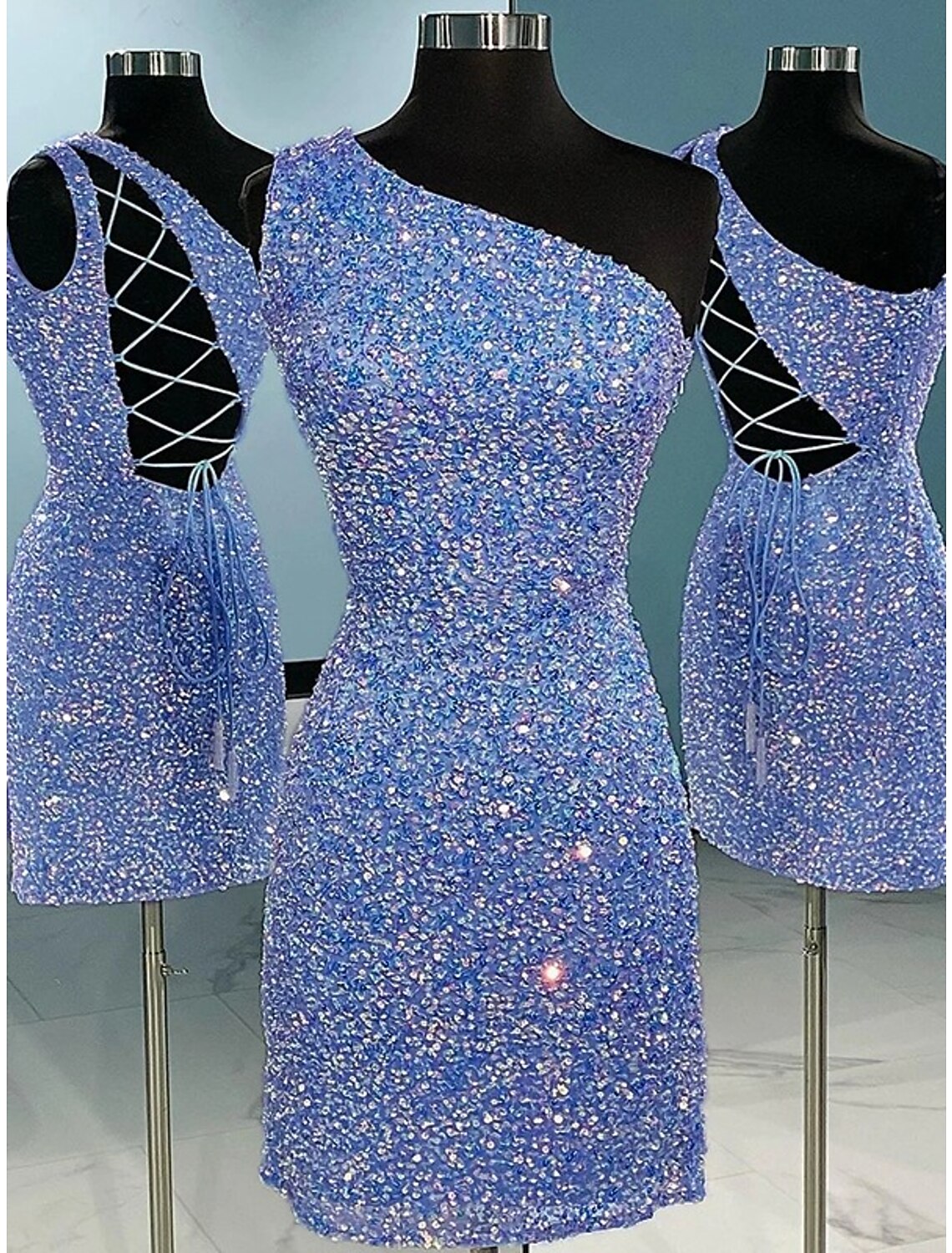 Sparkling A-line one-shoulder sequined mini dress with glitter details.
