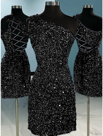 Close-up of the sequined fabric and one-shoulder strap.