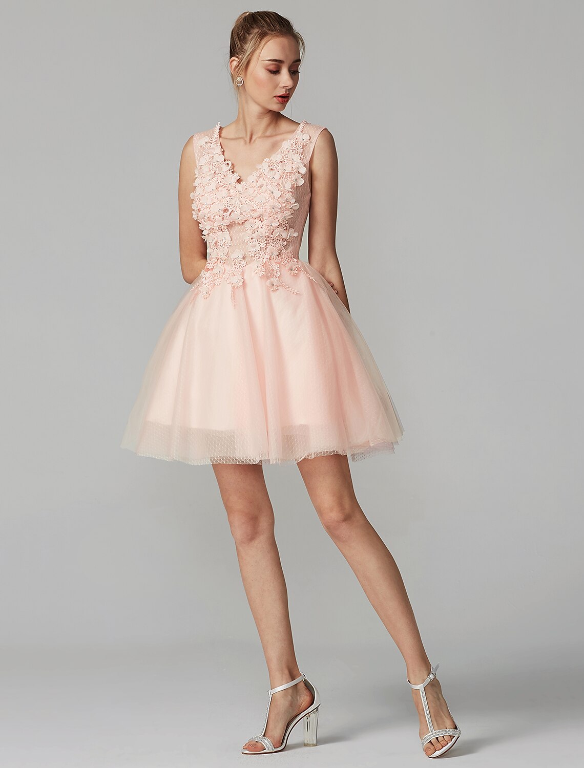 A-line V-neck short party dress with lace and crystal appliques.