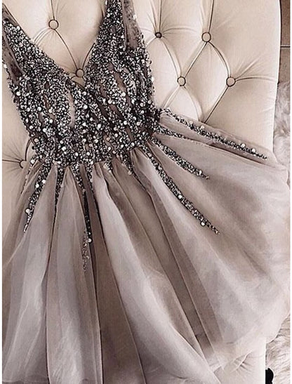Sparkling A-line V-neck short tulle homecoming dress.