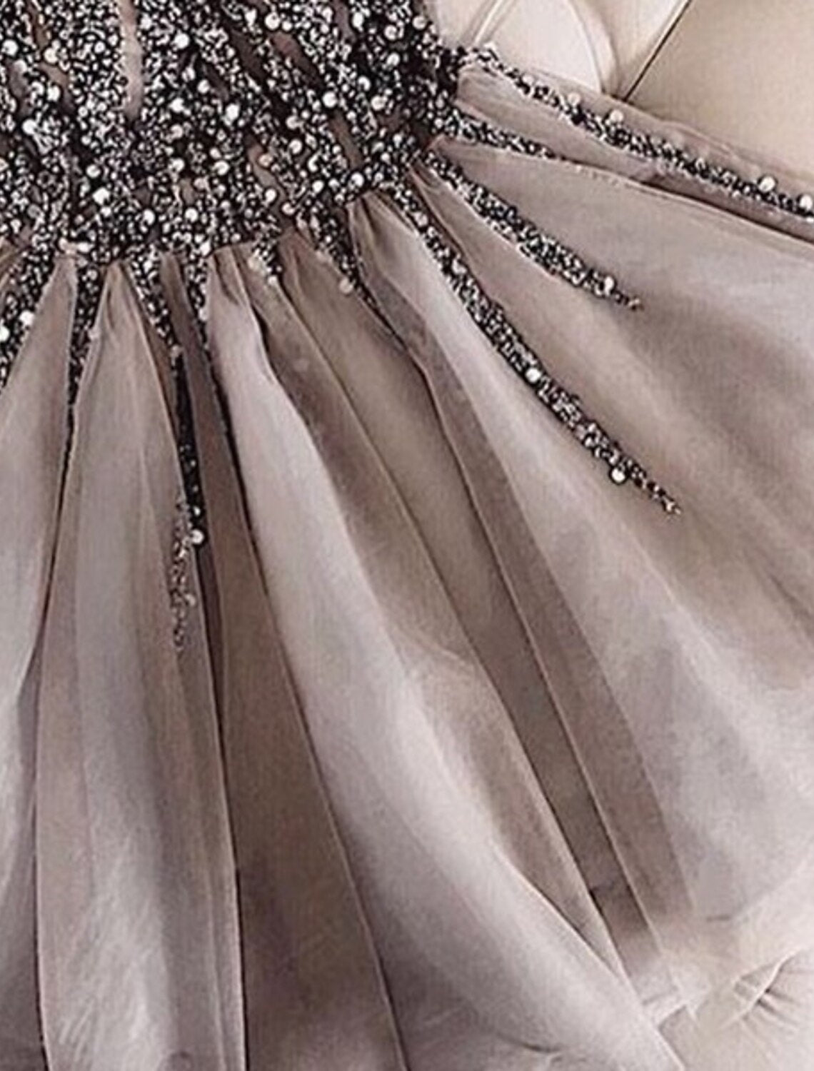 Close-up of the glitter tulle fabric on a homecoming dress.