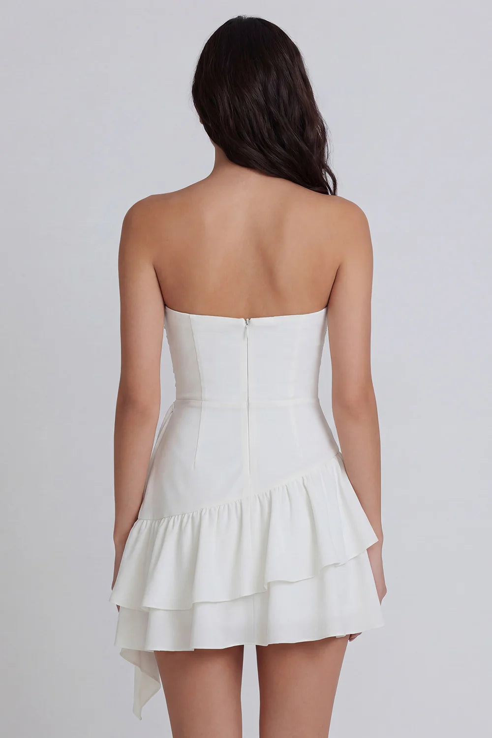 Strapless White Homecoming Dress with Ruched Bodice, Asymmetrical Tiered Ruffle Skirt and Draped Sash Detail