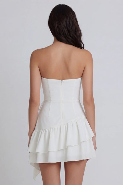 Strapless White Homecoming Dress with Ruched Bodice, Asymmetrical Tiered Ruffle Skirt and Draped Sash Detail