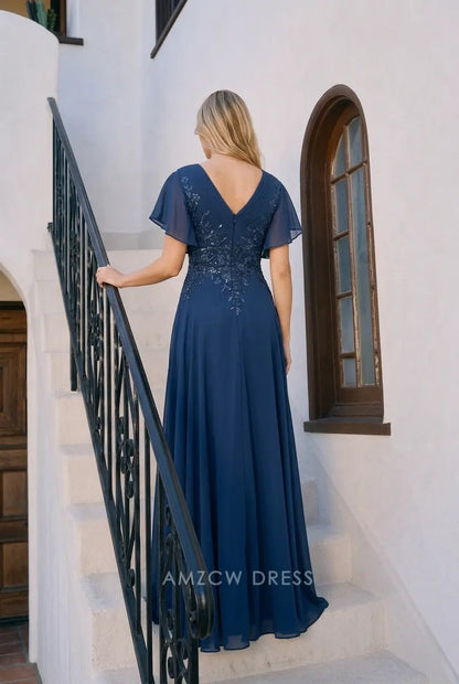 Stunning A-Line V-Neck Flutter Sleeve Embellished Navy Blue Floor-Length Prom Dress