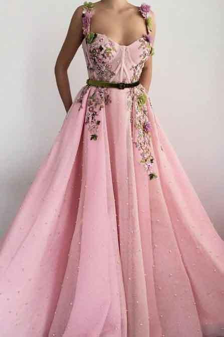 Vestidos de fiesta únicos con escote en forma de corazón, tirantes finos y bolsillos de flores