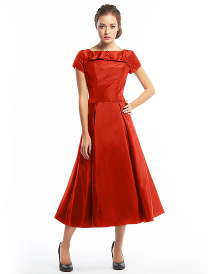 Back view of the vintage A-line dress, featuring button details.