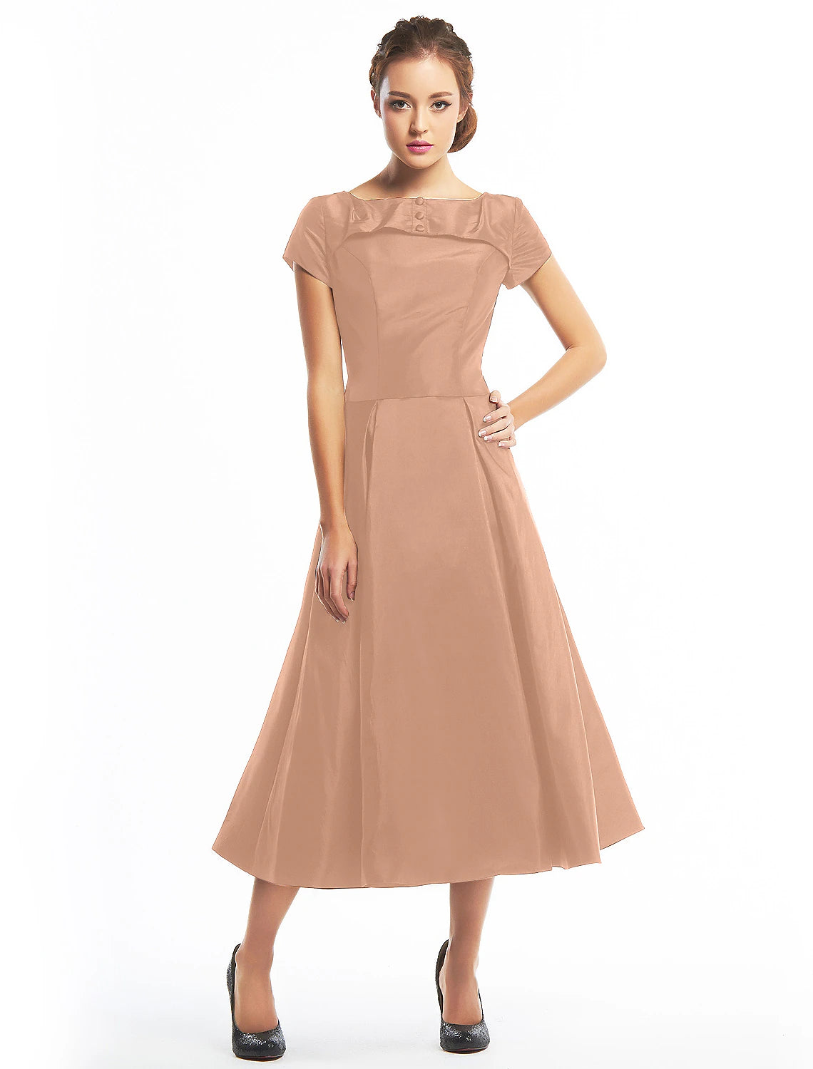 Model posing elegantly in the tea length homecoming dress.