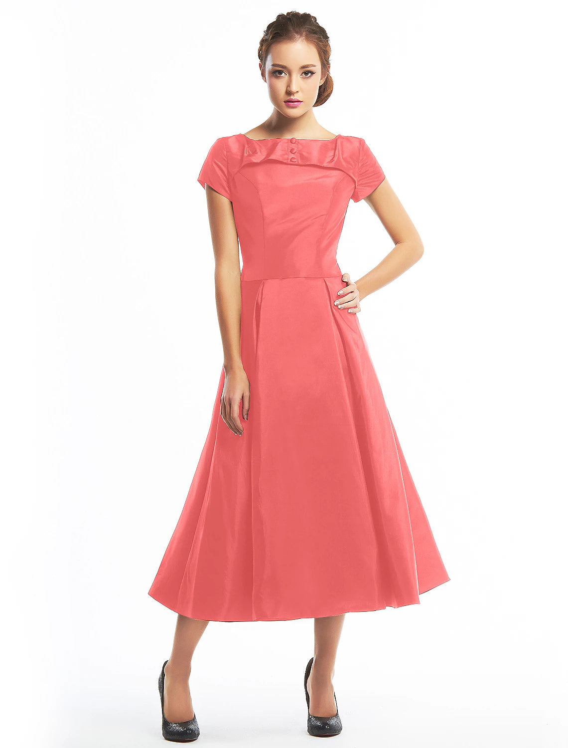 Close-up of the boat neck and short sleeves on the taffeta dress.
