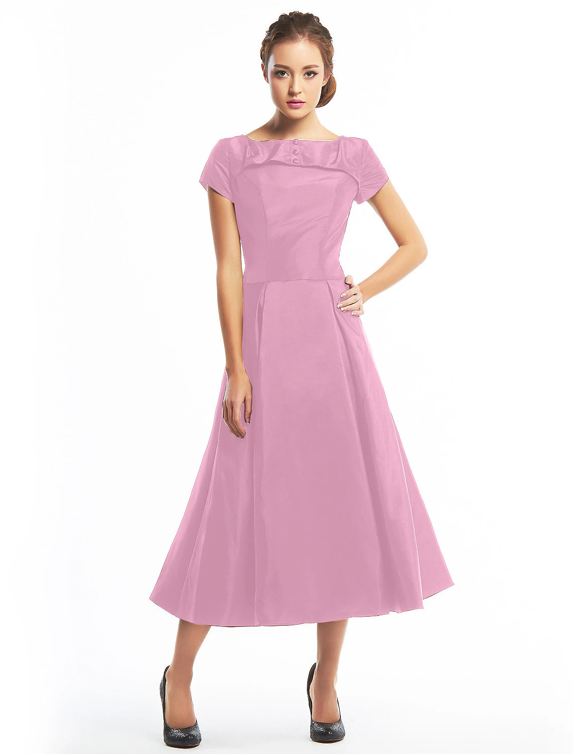 Model in the vintage A-line homecoming dress, captured in motion.