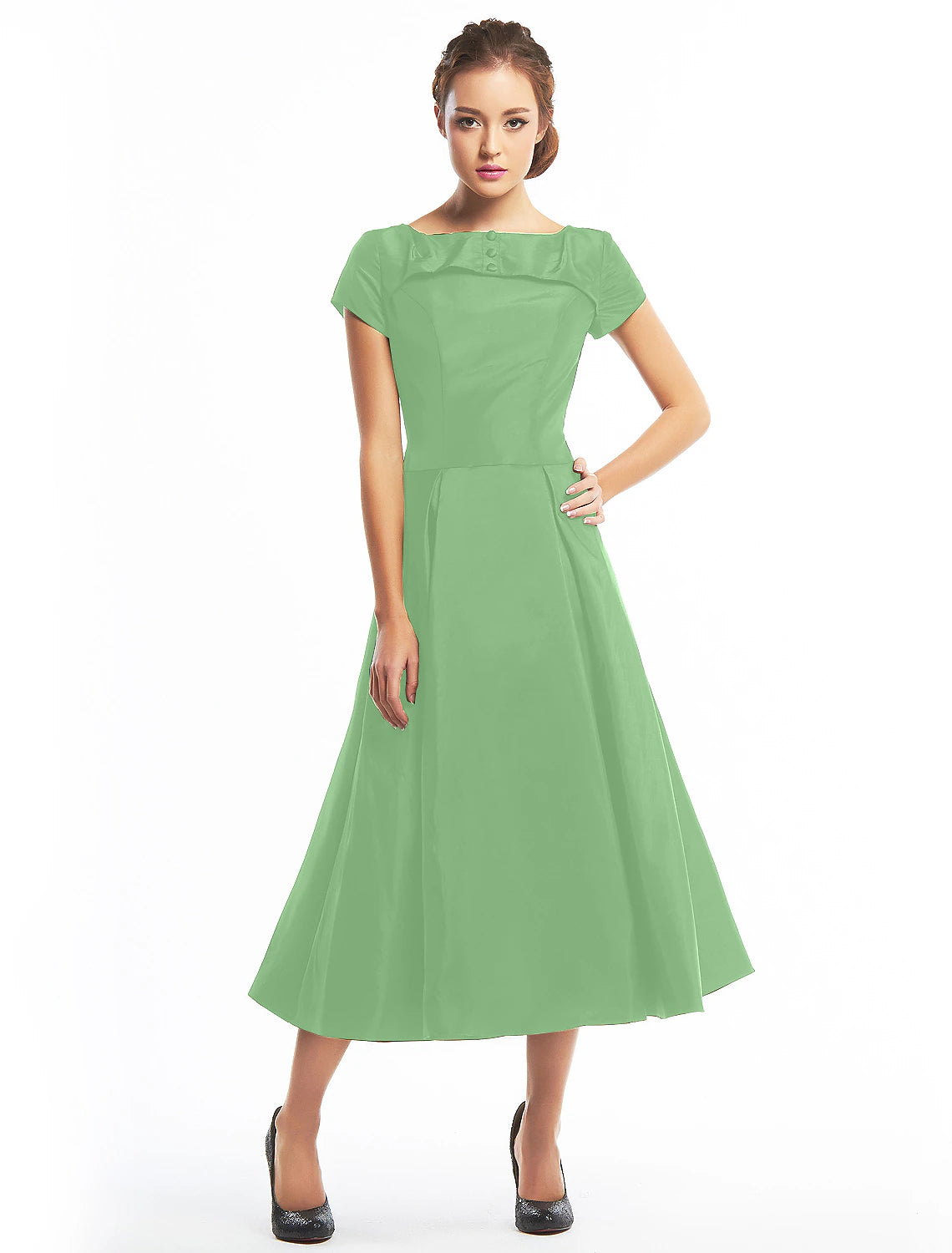 Taffeta fabric and button embellishments on the vintage dress.