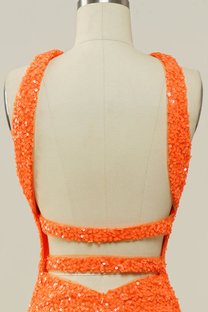 Vestido de fiesta de sirena con espalda descubierta, lentejuelas y cuello halter en color naranja
