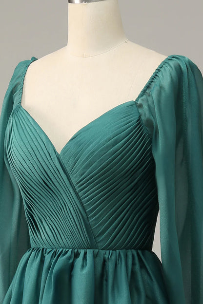 Vestido de fiesta de manga larga con hombros descubiertos y volantes