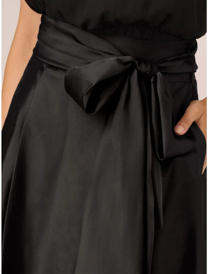 Vestido de fiesta para invitada de boda de corte A, vestido formal negro, talla grande, asimétrico, sin mangas, cuello joya, satén con lazo(s), pliegues y cristales.
