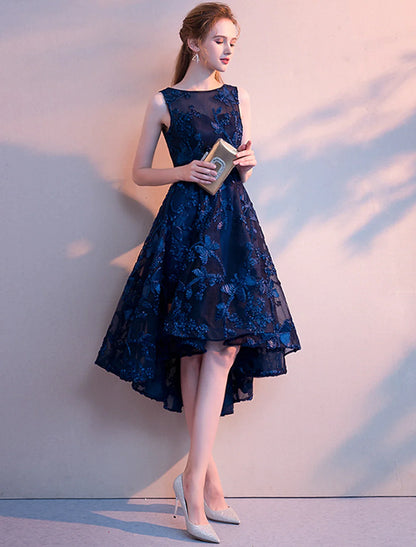 Close-up of the jewel neck and pleated bodice on the A-line tulle dress.