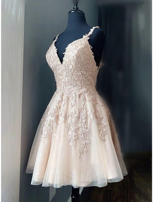A-Line homecoming dress with spaghetti straps and appliques, front view.