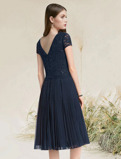 Back view of a chiffon homecoming dress showing the A-line silhouette.