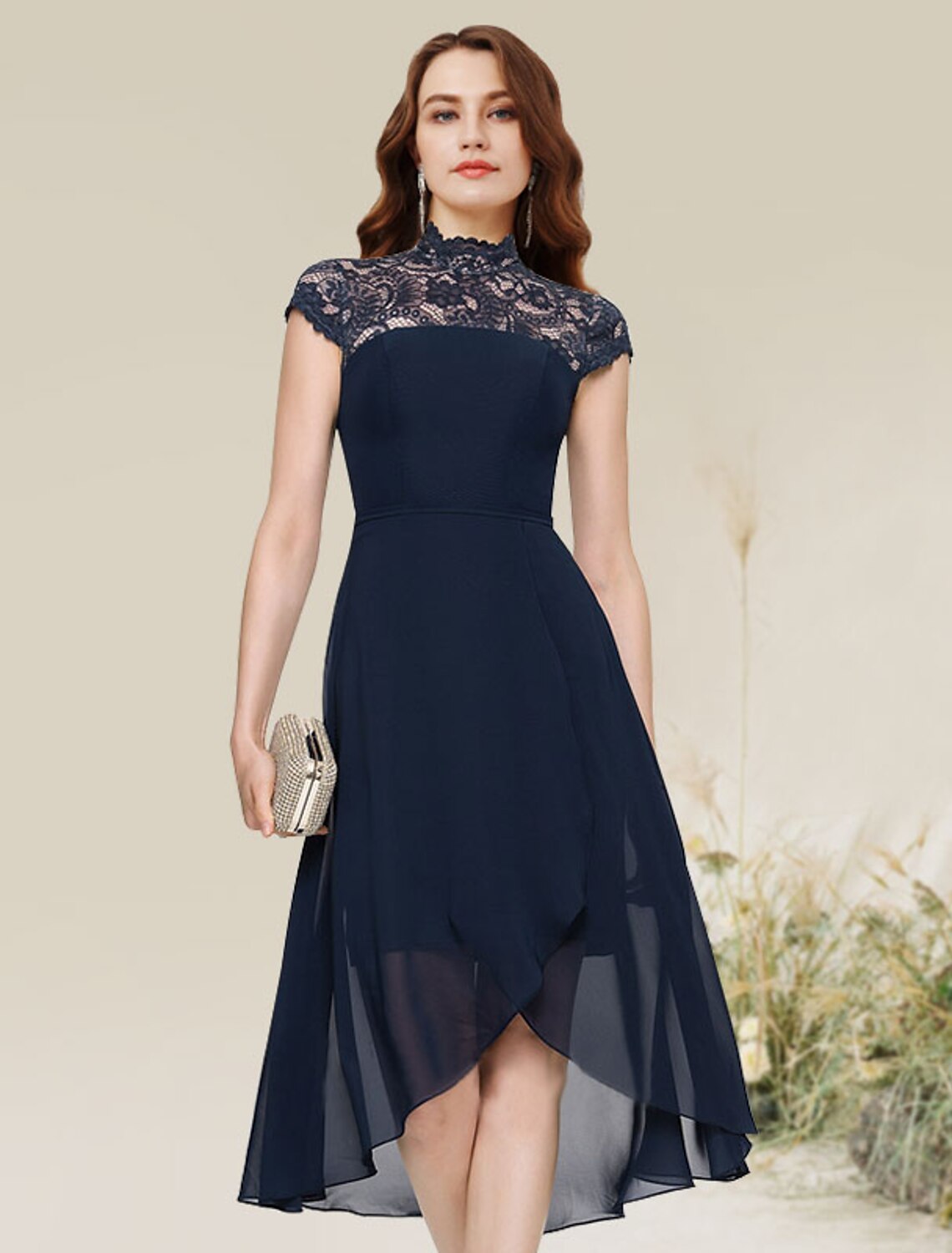 Model wearing an A-line asymmetrical chiffon cocktail dress with lace details.