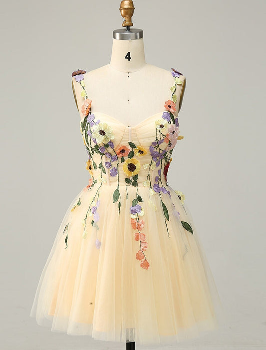 Front view of an A-line floral tulle homecoming dress with spaghetti straps.