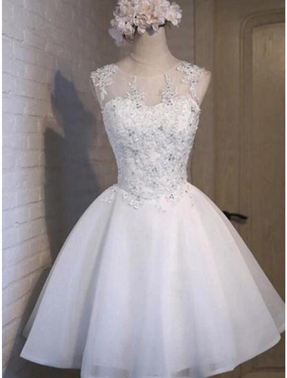 A-line floral tulle homecoming dress with appliques and a jewel neck.