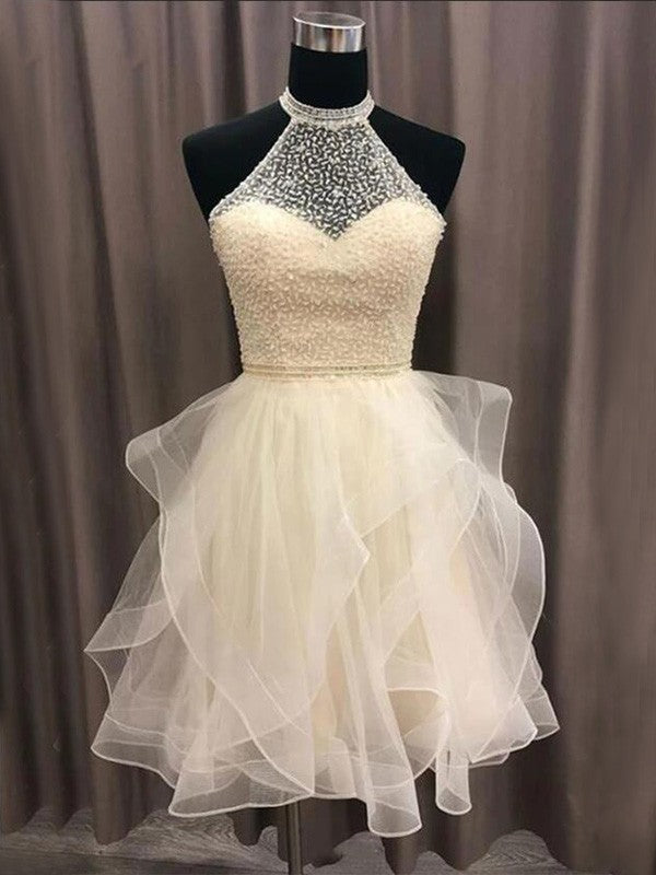 Front view of an A-Line organza short homecoming dress with halter neckline and beading.