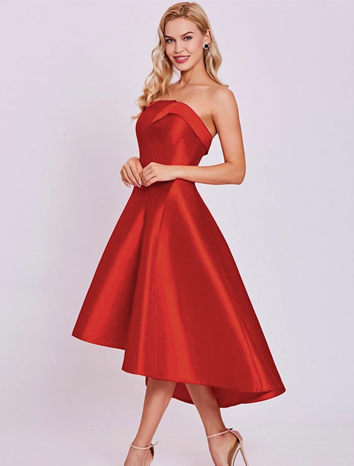 A-line tea length strapless satin cocktail dress in a minimalist style.