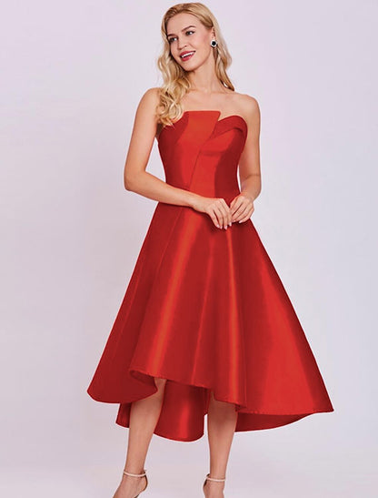 Close-up of the satin fabric and strapless neckline of the elegant dress.