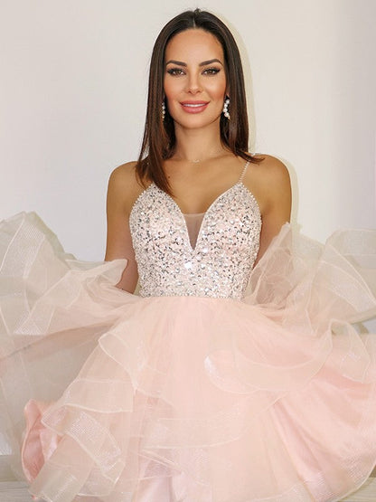 Close-up of the beaded bodice on the A-line tulle homecoming dress.