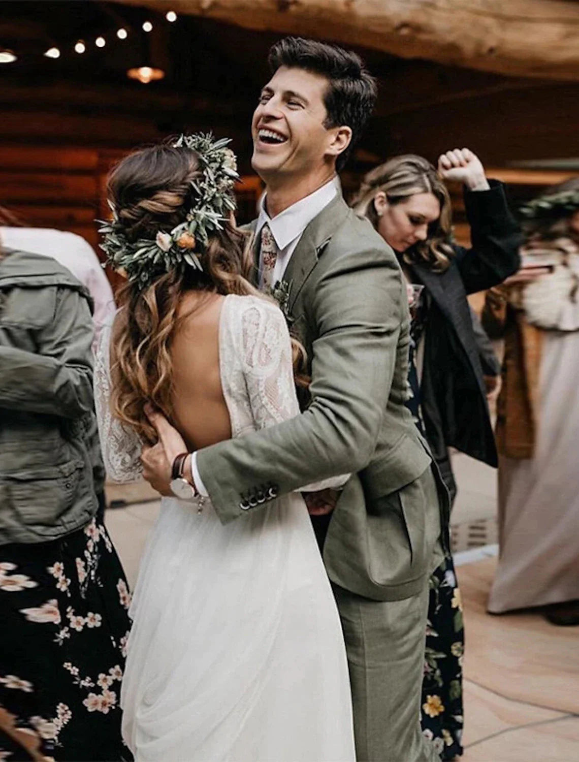 Side view of the A-Line Boho wedding dress, showing the sweep train.