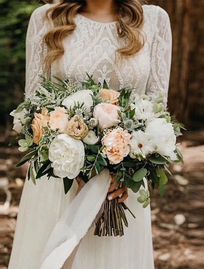 Front view of the Boho A-Line wedding dress with scoop neck and long sleeves.