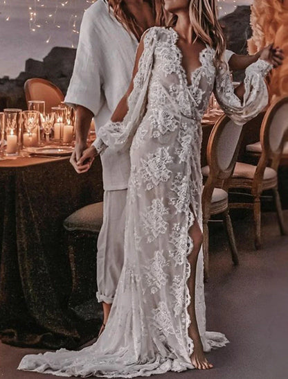 Side profile of the bride in the long sleeve lace A-Line wedding dress.