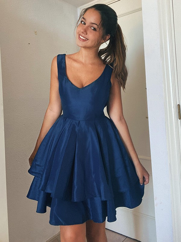 Front view of a chic A-Line Princess short homecoming dress with spaghetti straps.