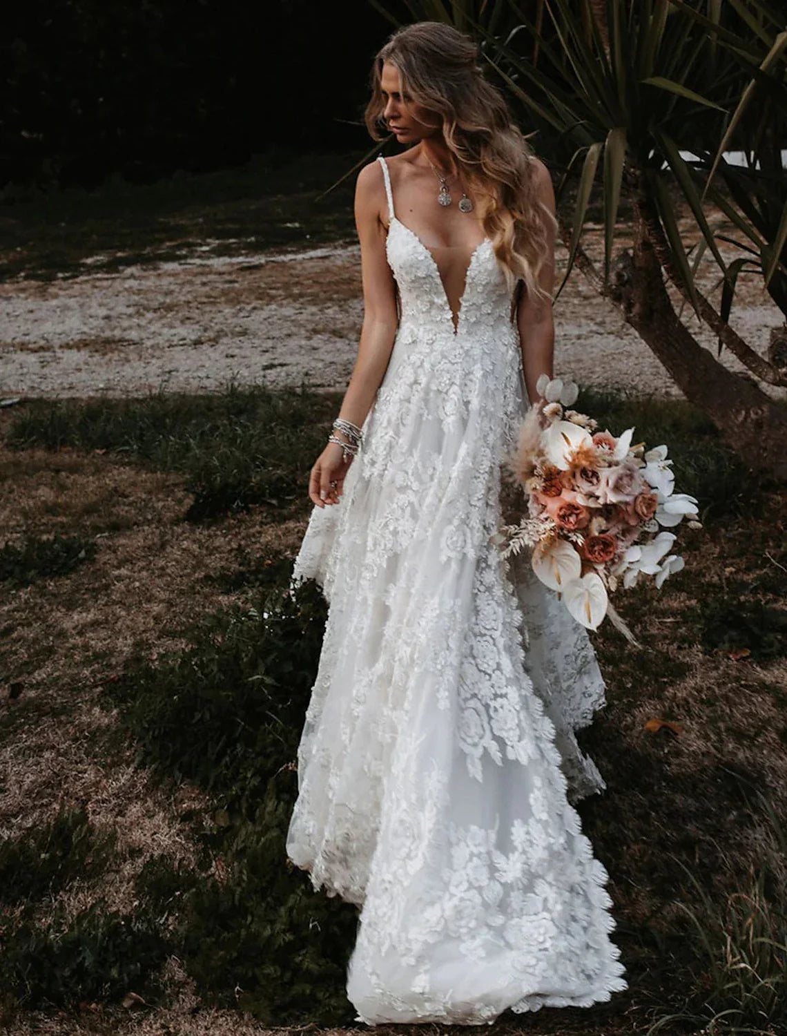 Full view of A-line sweetheart boho wedding dress with lace appliques.