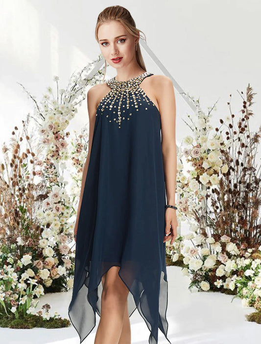 Woman wearing an elegant A-line halter cocktail dress with asymmetrical hem, crystals, and beading, front view.