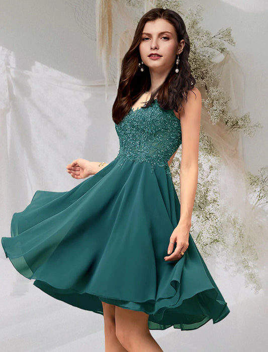 Model wearing an elegant A-line short chiffon cocktail dress with a V-neck, beading, and lace details.