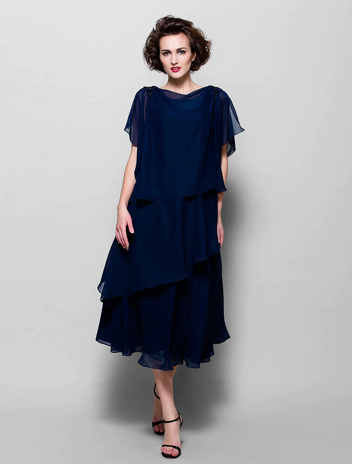 Full length view of the A-Line tea-length dress for special occasions.
